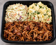 Barbecue pulled pork with coleslaw and potato salad