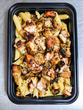 Lemon pepper honey garlic chicken over Italian dressed penne